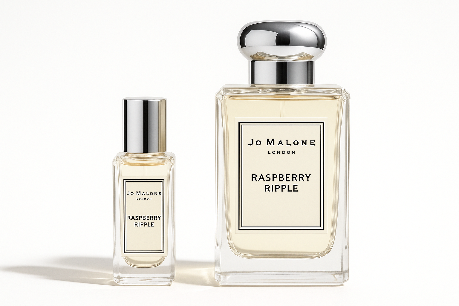 Jo Malone Raspberry Ripple 12ml 试用装，与 100ml 装 Jo Malone Raspberry Ripple 香水瓶并排放置